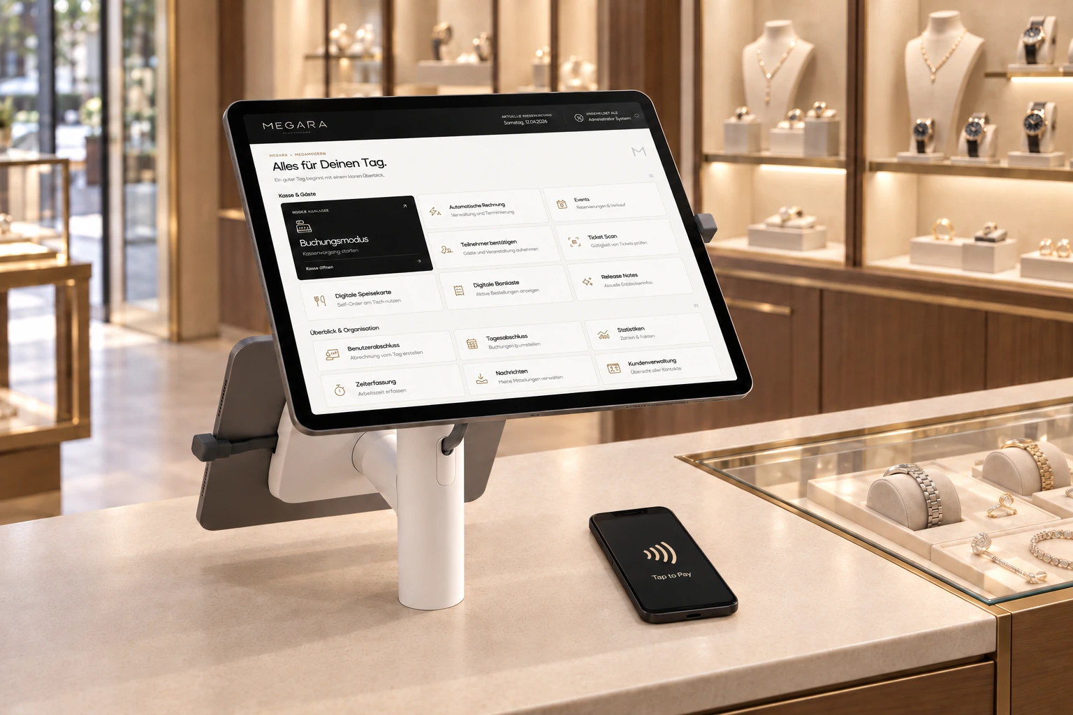 Megara checkout on a white dual-tablet stand at a jewellery sales counter, with the back of the customer display, a slim Tap to Pay phone and watches facing the customer under glass